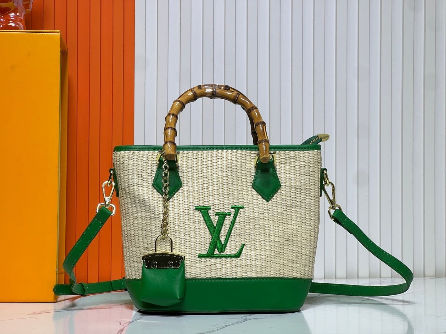 890f1caa9668d73a0f3e1af19a92cf14 Louis Vuitton Raffia Petit Bucket Tote - Image 1