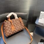 Louis Vuitton Sully PM leather handbag